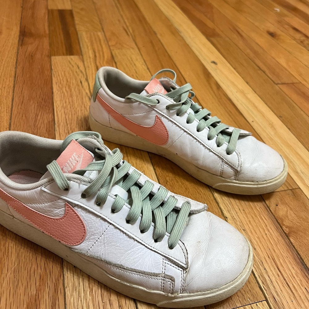 Low white and pink sneakers with green accents